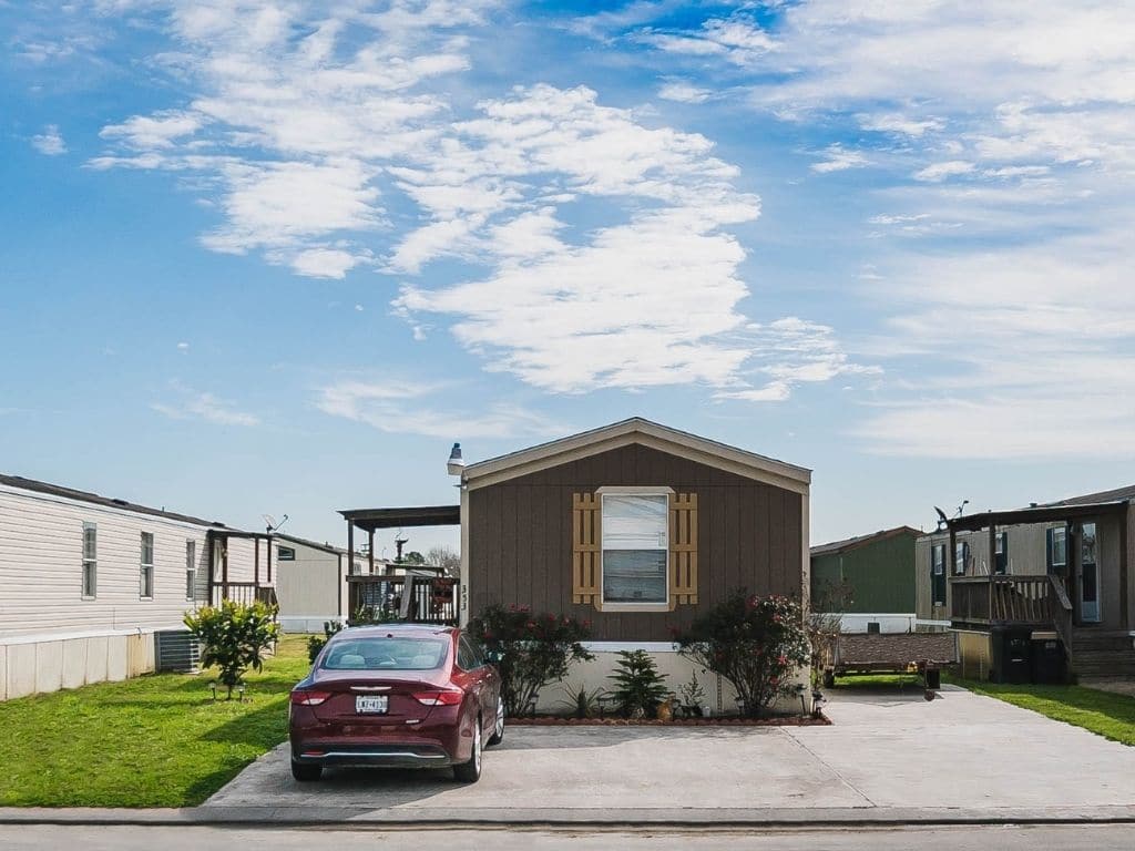 manufactured home single family rentals in houston, TX with car in front