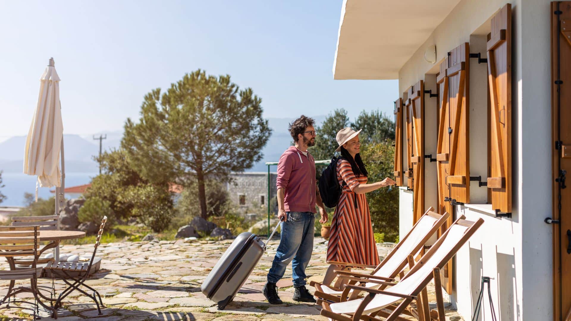 couple walking into airbnb
